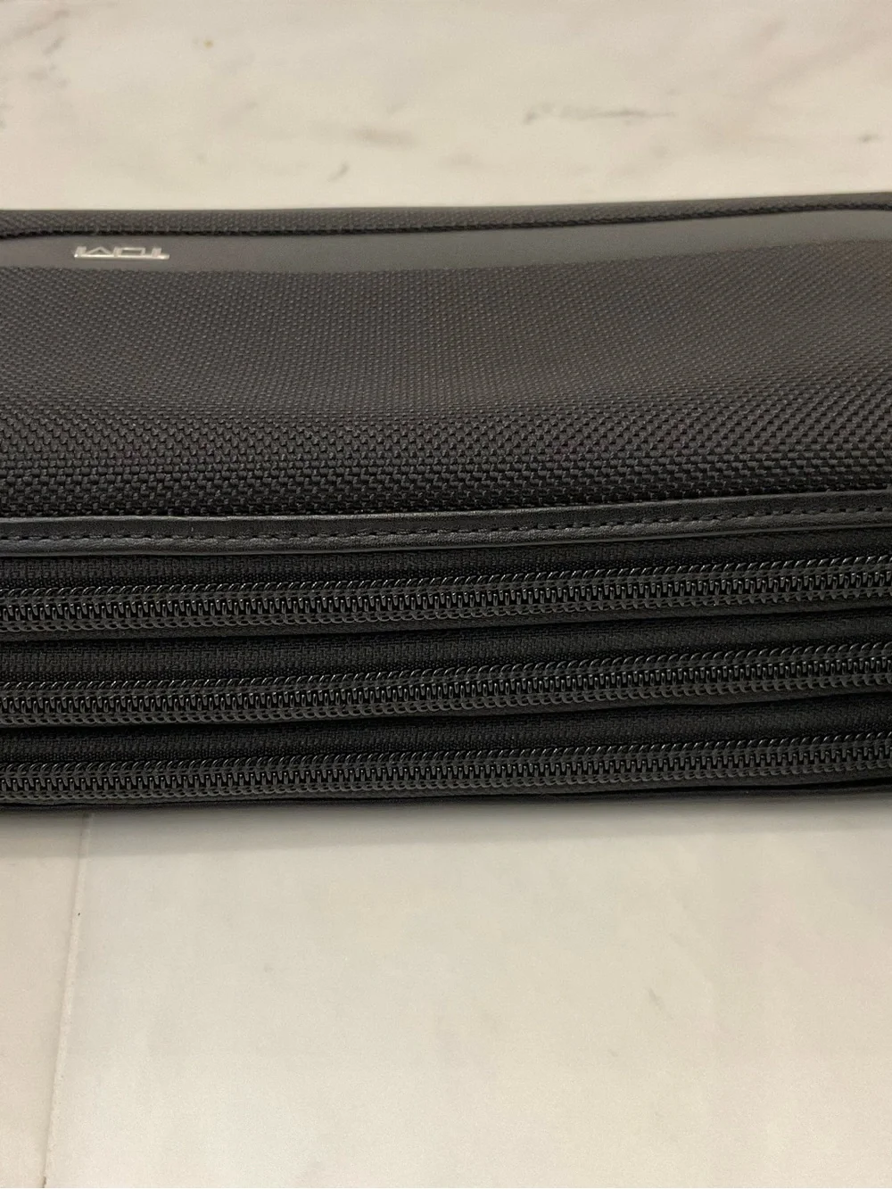 Tumi up sale